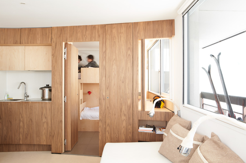 The best decision for a big family by h20 Architectes: ‘furniture-wall’