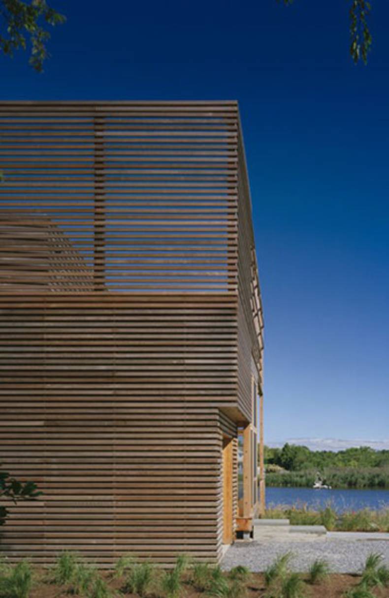 A Linear Wooden Beach House Full of Light by Steven Holl